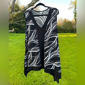 “New” sleeveless shark-bite tank top.  By the “Avenue”.